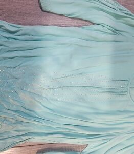 Teal dress shirt- Jennifer Lopez